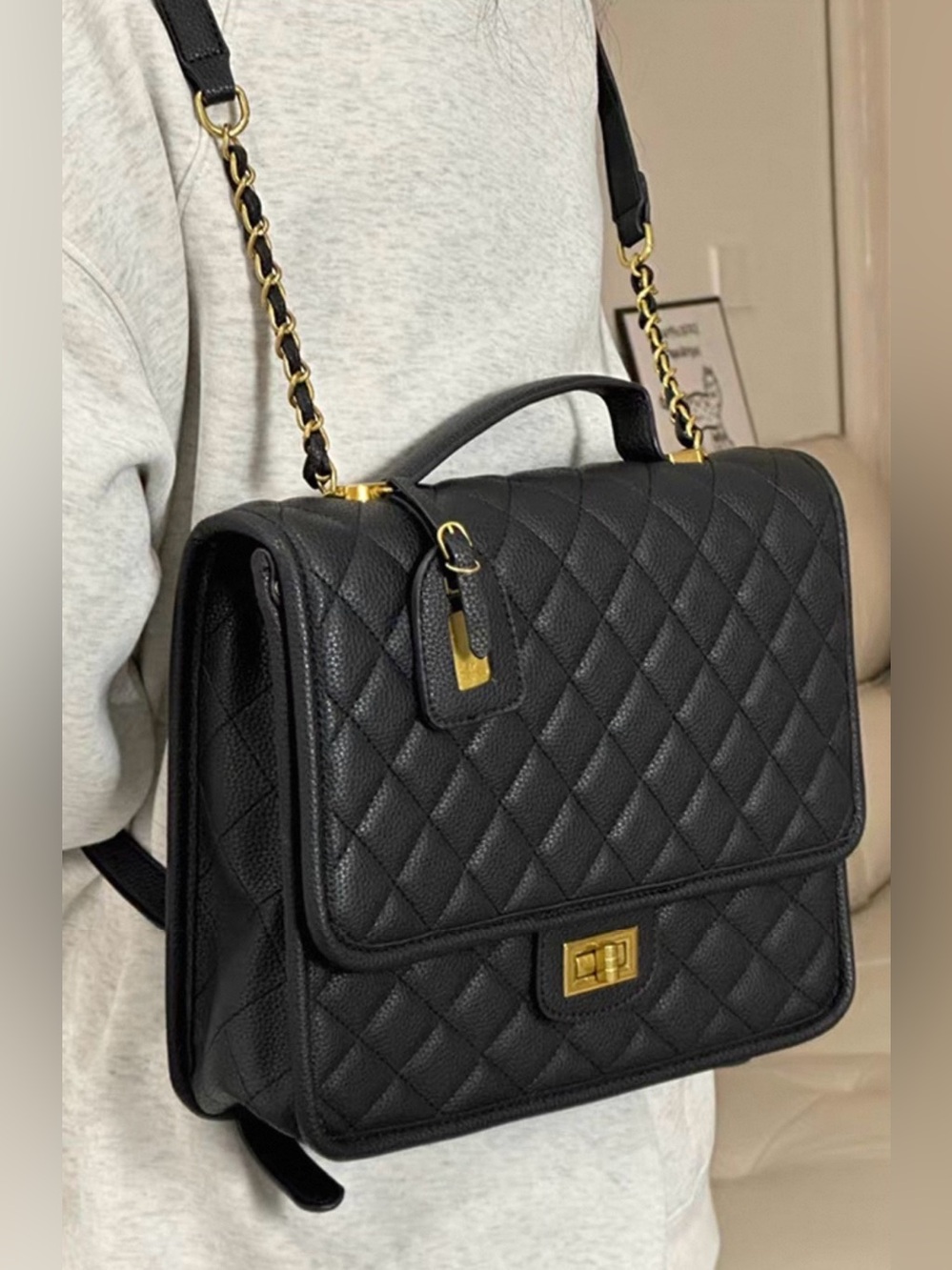 Black Quilted Top-Handle Shoulder Bag with Gold Hardware